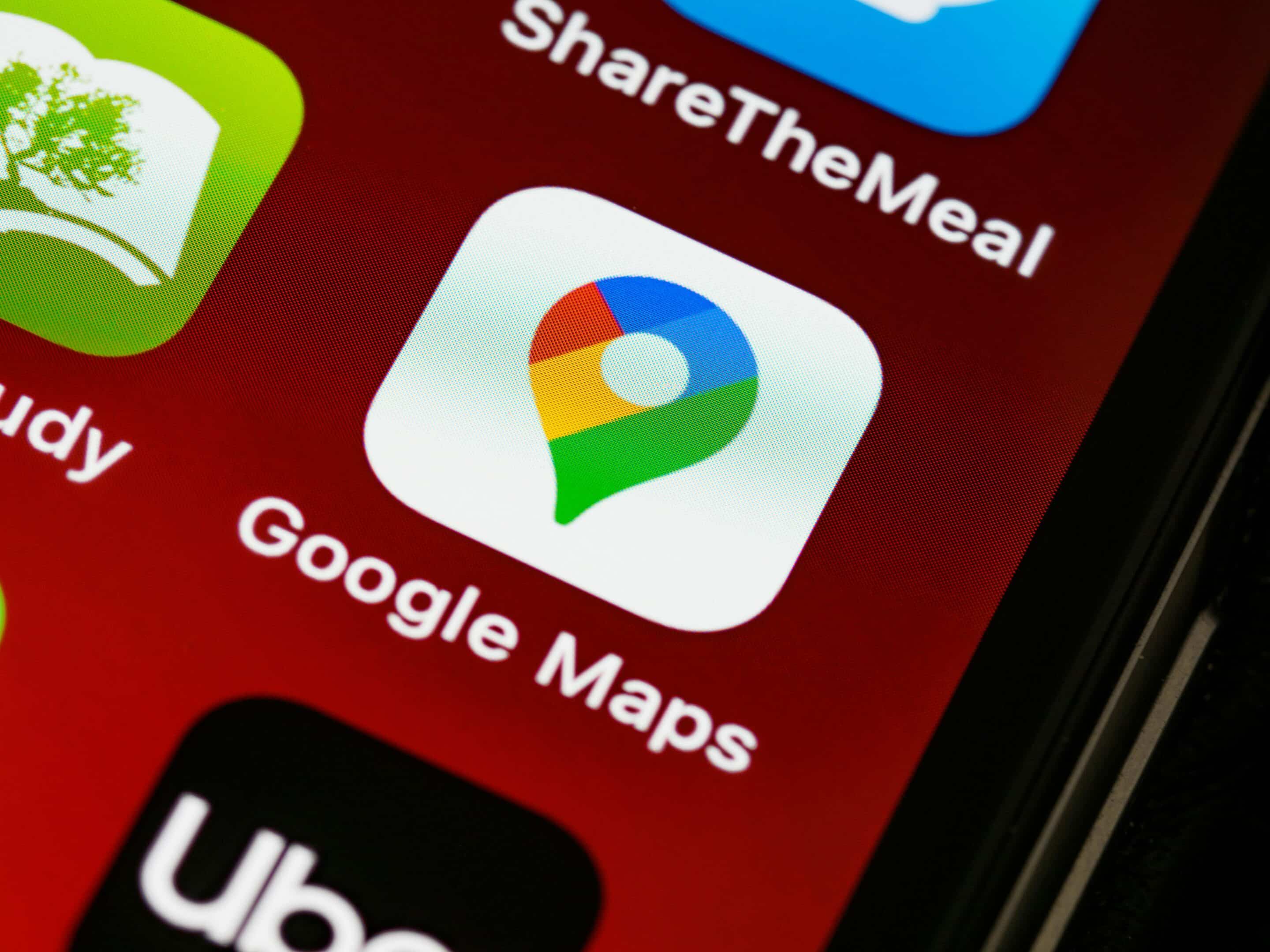 Close-up of a smartphone screen showing the Google Maps app icon, representing Google Business Profile management that helps businesses in Grand Rapids, Detroit, and Marquette improve visibility in local search, Maps results, and AI-powered search experiences.
